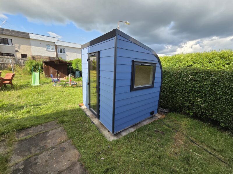 eSnug garden studio with pigeon blue cladding