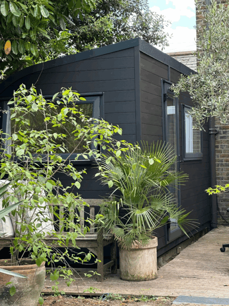 eSnug 4-metre garden studio with additional windows, arranged as a workshop